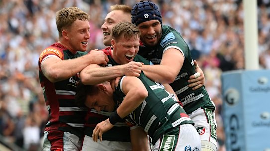 LONDON, ENGLAND - JUNE 18: Freddie Burns of Leicester Tigers celebrates with teammates after the final whistle following victory in the Gallagher Premiership Rugby Final match between Leicester Tigers and Saracens at Twickenham Stadium on June 18, 2022 in London, England. (Photo by Mike Hewitt/Getty Images)