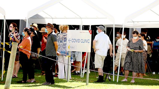 People queue for a COVID test outside Royal Perth Hospital.
