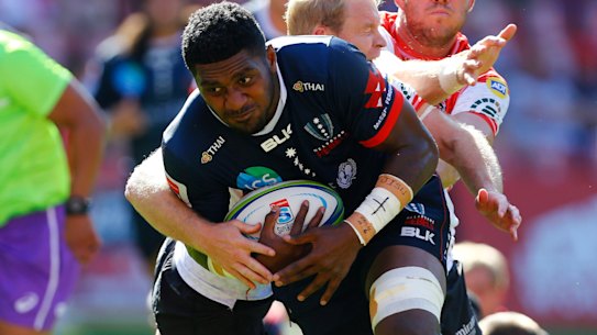 On the charge: The Rebels' Isi Naisarani in action against the Lions.