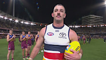 Taylor Walker leaves The Gabba.