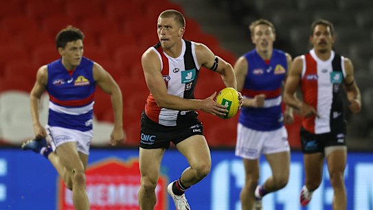 MELBOURNE, AUSTRALIA - JUNE 14: Sebastian Ross of the Saints runs with the ball during the round 3 AFL match between the St Kilda Saints and the Western Bulldogs at Marvel Stadium on June 14, 2020 in Melbourne, Australia. (Photo by Robert Cianflone/Getty Images)