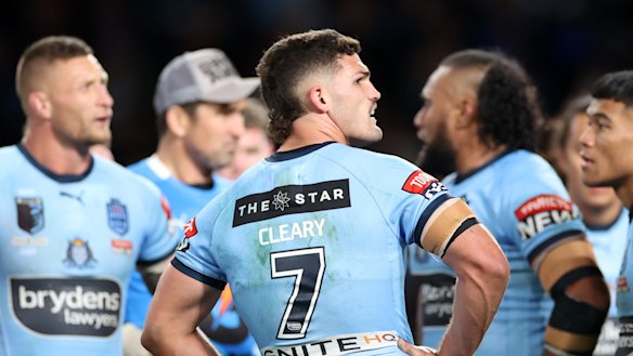 Nathan Cleary and the Blues gather under the posts after conceding a try.