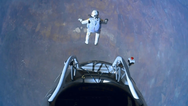 Felix Baumgartner of Austria as he jumps out of the capsule during the final manned flight for Red Bull Stratos, 2012. In a giant leap from more than 24 miles up, Baumgartner shattered the sound barrier while making the highest jump ever from a balloon to a safe landing in the New Mexico desert.