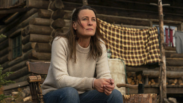 Edee (Robin Wright) on the porch of her mountainside cabin retreat in Land.