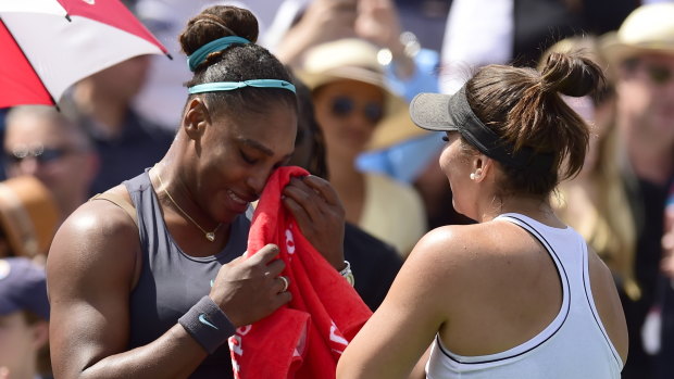 Bianca Andreescu (right) consoles Serena Williams.
