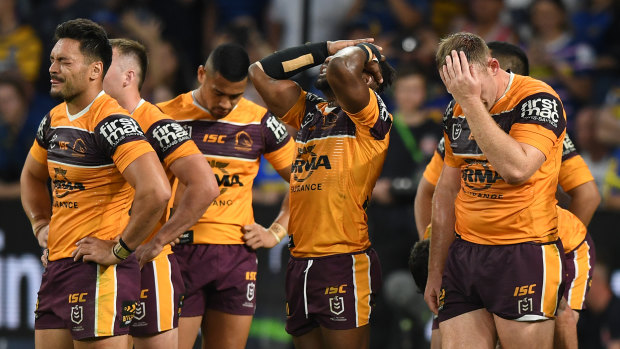 Broncos players react after conceding a try against the Eels at Bankwest Stadium in Sydney on Sunday.