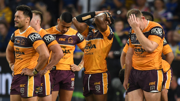 Broncos players react after conceding a try against the Eels at Bankwest Stadium in Sydney on Sunday.