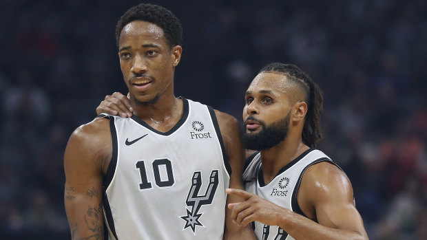 Leadership: Patty Mills (right), alongside DeMar DeRozan, plays an important role for the Spurs.