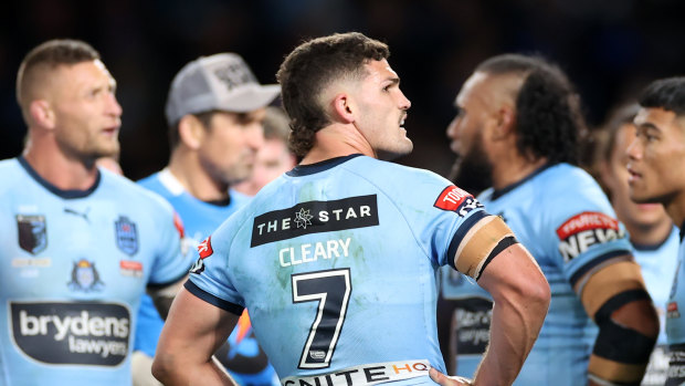 Nathan Cleary and the Blues gather under the posts after conceding a try.