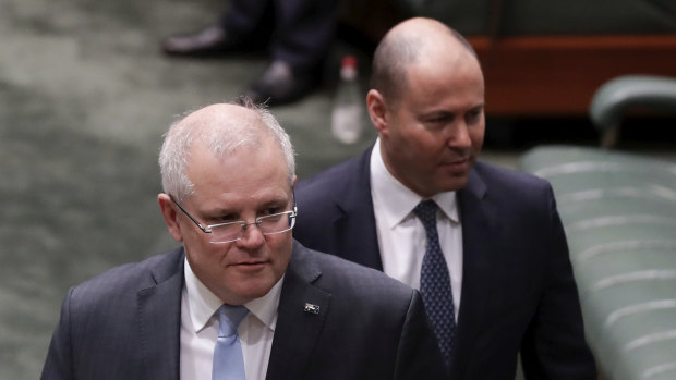 Prime Minister Scott Morrison and Treasurer  Josh Frydenberg arrive in the House of Representatives this morning to start debate on the government's JobKeeper wage subsidy.