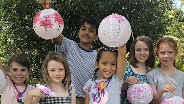 Children at the 'Paint a lantern' Lunar New Year event in the Royal Botanic Gardens.