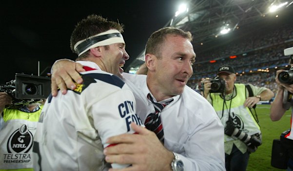 Ricky Stuart celebrates with Brad Fittler after winning a title in 2002.