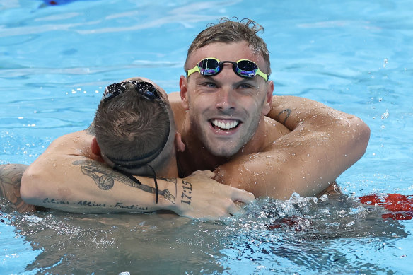 Australia’s Kyle Chalmers hugs America’s Caeleb Dressel after the men’s relay final.