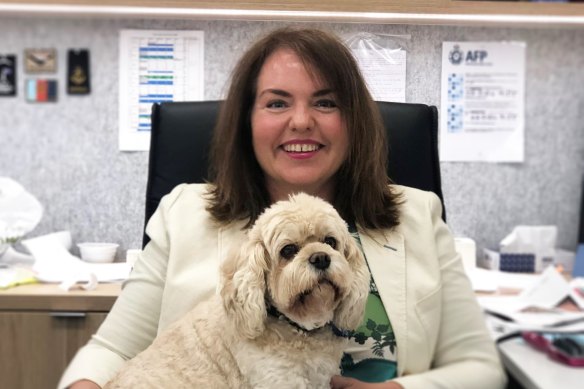 The late senator and childhood friend of Chloe Shorten, Kimberley Kitching, with her Cavoodle, Nancy-Jane.