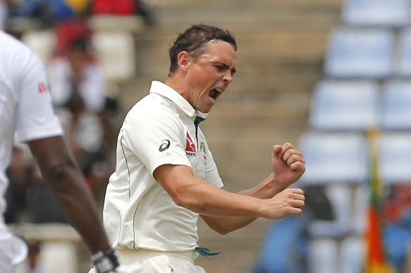 Steve O’Keefe celebrates a wicket for Australia.