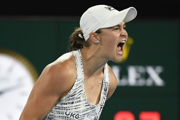Ash Barty celebrates after defeating Danielle Collins. 