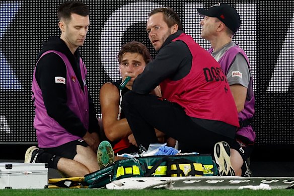 Harrison Jones gets immediate treatment on the ground.