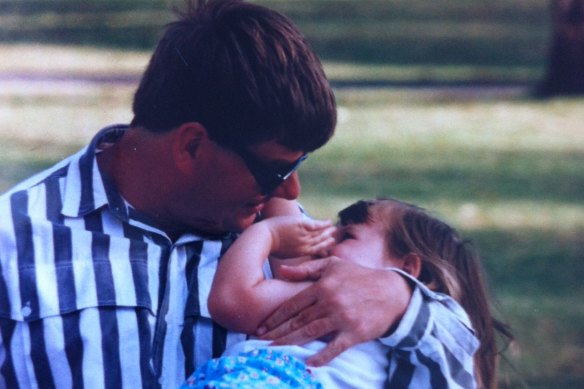 Sam Wright as a child with her dad.