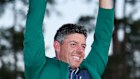 Rory McIlroy poses with the Masters trophy.