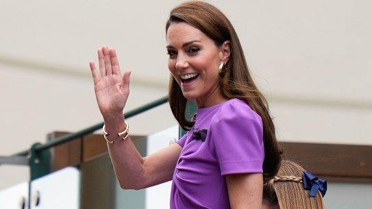 Catherine, Princess of Wales, waves as she makes a rare public appearance.