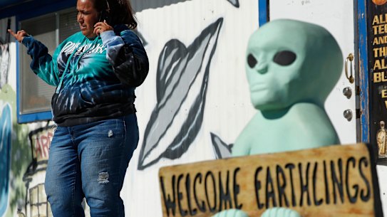 Little A'Le'Inn owner Connie West speaks on the phone outside of the bar and restaurant in Rachel, near Area 51, Nevada.