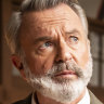 A gleeful Sam Neill adds some magic to this curious case of ghouls and goblins