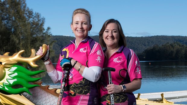 Fiona Dews (at left) and Rose Glassock at the Sydney International Regatta Centre in Penrith, NSW. After surviving breast cancer “the dragon boats brought us together”, says Dews.