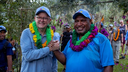 Albanese and Marape during their trek.