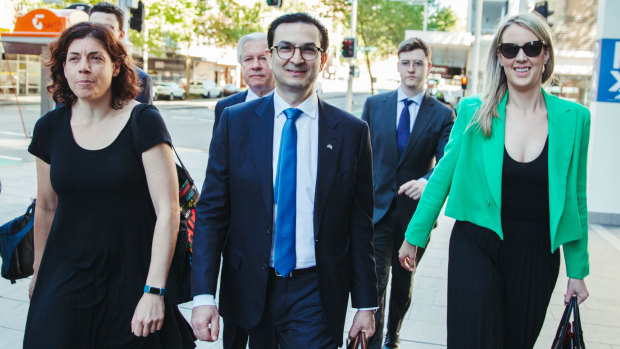 Barrister Sue Chrysanthou SC, surgeon Munjed Al Muderis with partner Claudia Roberts in September 2023.