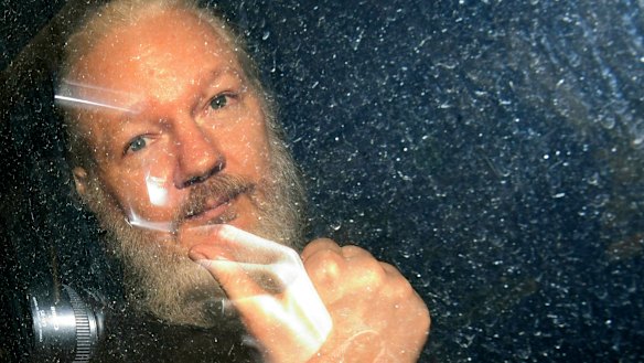 Julian Assange is driven from the Ecuadorian embassy in London after his arrest in April 2019.