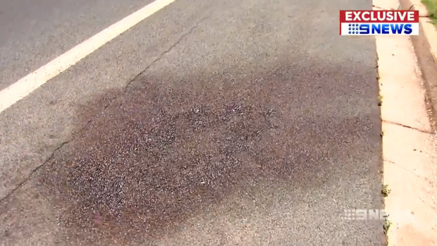 A blood stained road remains after a night of violent stabbings in Goulburn.