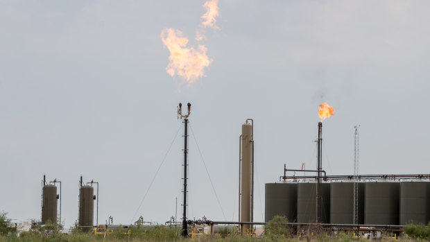 Methane gas flares at a refinery.
