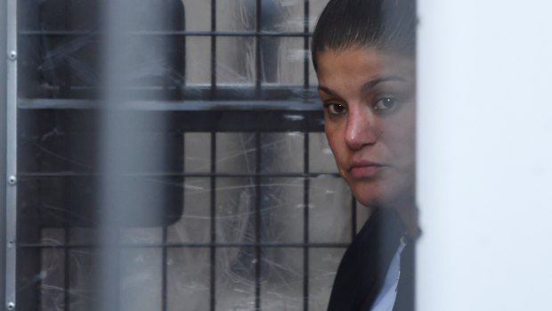 Katherine Abdallah arrives at court in a prison vehicle on Tuesday. 