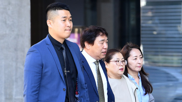 Family members of murdered Korean student Eunji Ban arrive at the Brisbane Supreme Court on Monday. 