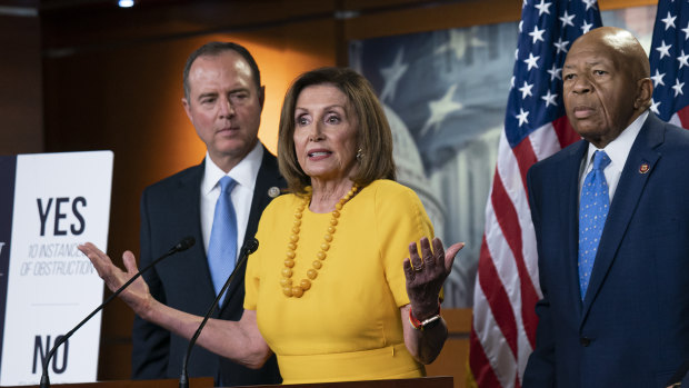 Speaker of the House Nancy Pelosi, centre, and other Democrats hold a press conference after the back-to-back Mueller hearings. 