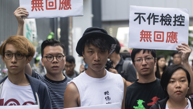 Jimmy Sham, centre, with other protest leaders in June.