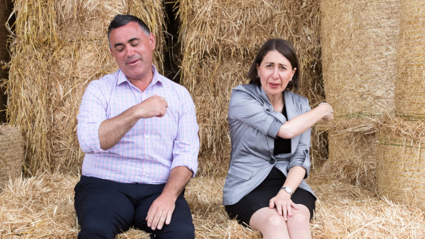 NSW Premier Gladys Berejiklian, and Deputy Premier, John Barilaro, on Boyd Baling farm in Lismore, in March. 