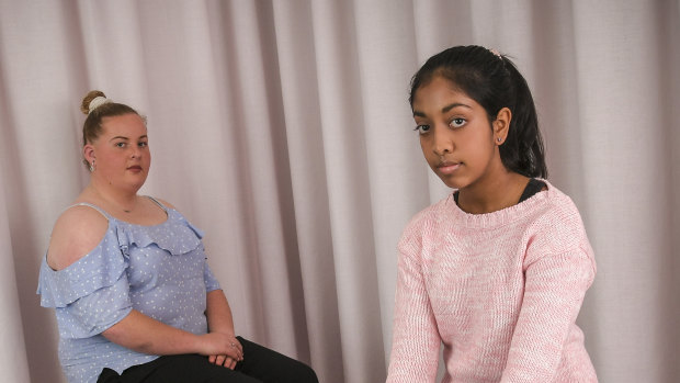 Year 10 student Natasha McIntyre and year 7 student student Binusha Pathirana say it's unfair to be punished when their peers misbehave. 