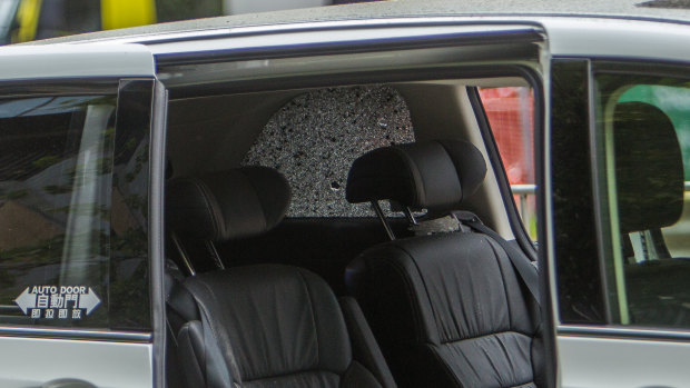 The windows of a passing SUV were shattered in the explosion, injuring one man inside.
