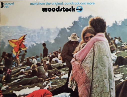 Bobbi Ercoline (then Bobbi Kelly) hugging her future husband, Nick, on the cover of the Woodstock soundtrack album.