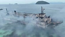 The smouldering remains of the ferry MV June Aster that caught fire off Palawan province, western Philippines.
