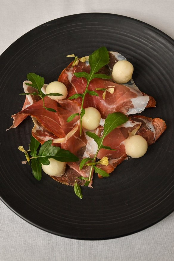 Black pig prosciutto with Christmas melon.