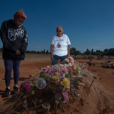 Sherona Roe and Carol Roe at the grave of  Ms Dhu in the Geraldton cemetery. 