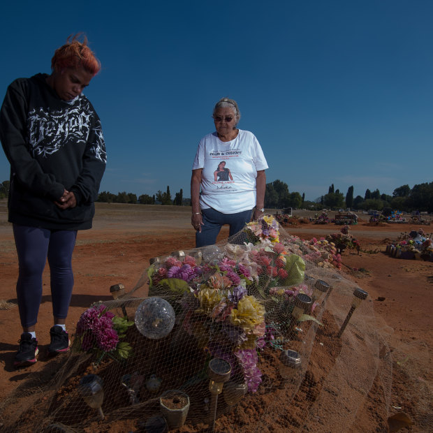 Sherona Roe and Carol Roe at the grave of  Ms Dhu in the Geraldton cemetery. 