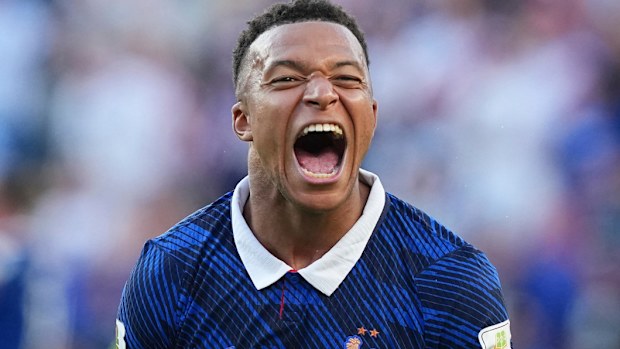 Mbappe battled aggressive tactics from Paraguay.