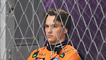 Oscar Piastri watches on after crashing out in the 2025 Azerbaijan Grand Prix.
