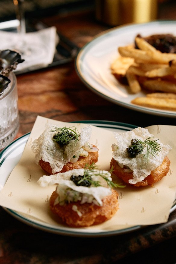 Scallops with potato scallops, Oscietra caviar and chives.