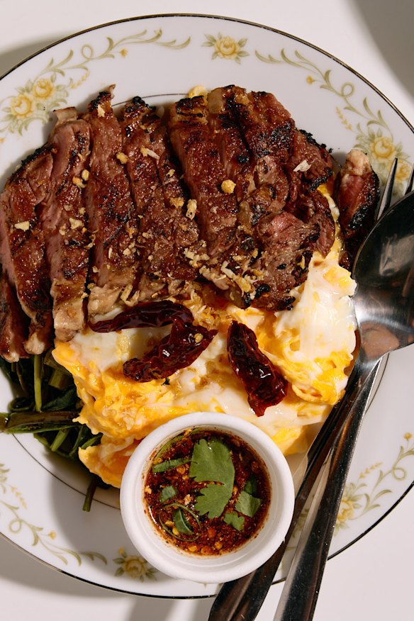 Khao kai kon with coal-grilled scotch fillet.