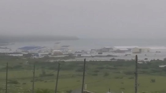 In this image taken from a video released by Geophysical Service of the Russian Academy of Sciences, shows the aftermath of tsunami hitting the coastal area of Severo-Kurilsk at Paramushir island of Kuril Islands, Russia, Wednesday, July 30, 2025. (Geophysical Service of the Russian Academy of Sciences via AP)