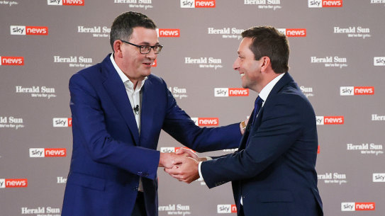 Matthew Guy and Daniel Andrews shake hands before the start of Tuesday’s debate.